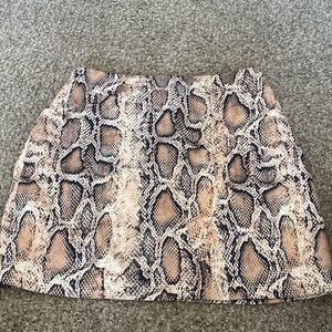 snakeskin printed mini skirt